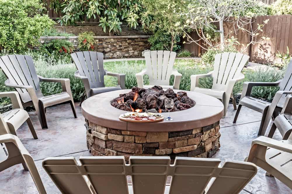 stone firepit and chairs.