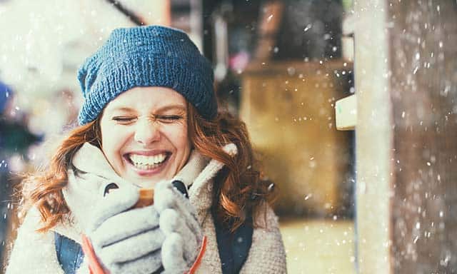 woman smiling during winter.